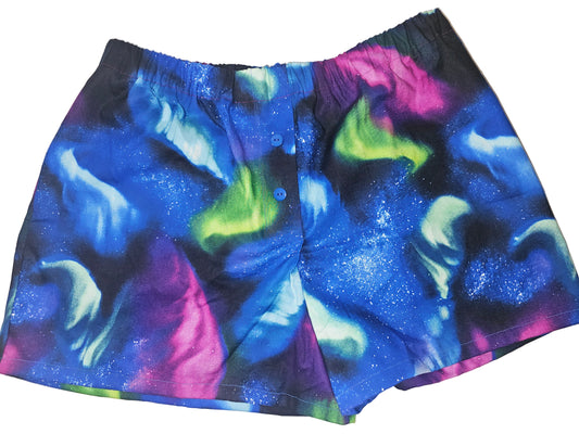 Aurora Starlight Dreams — Large women's boxers with a galaxy-inspired aurora print in blue, purple, green and pink, soft lounge shorts with pockets, ideal for sleep and relaxation.