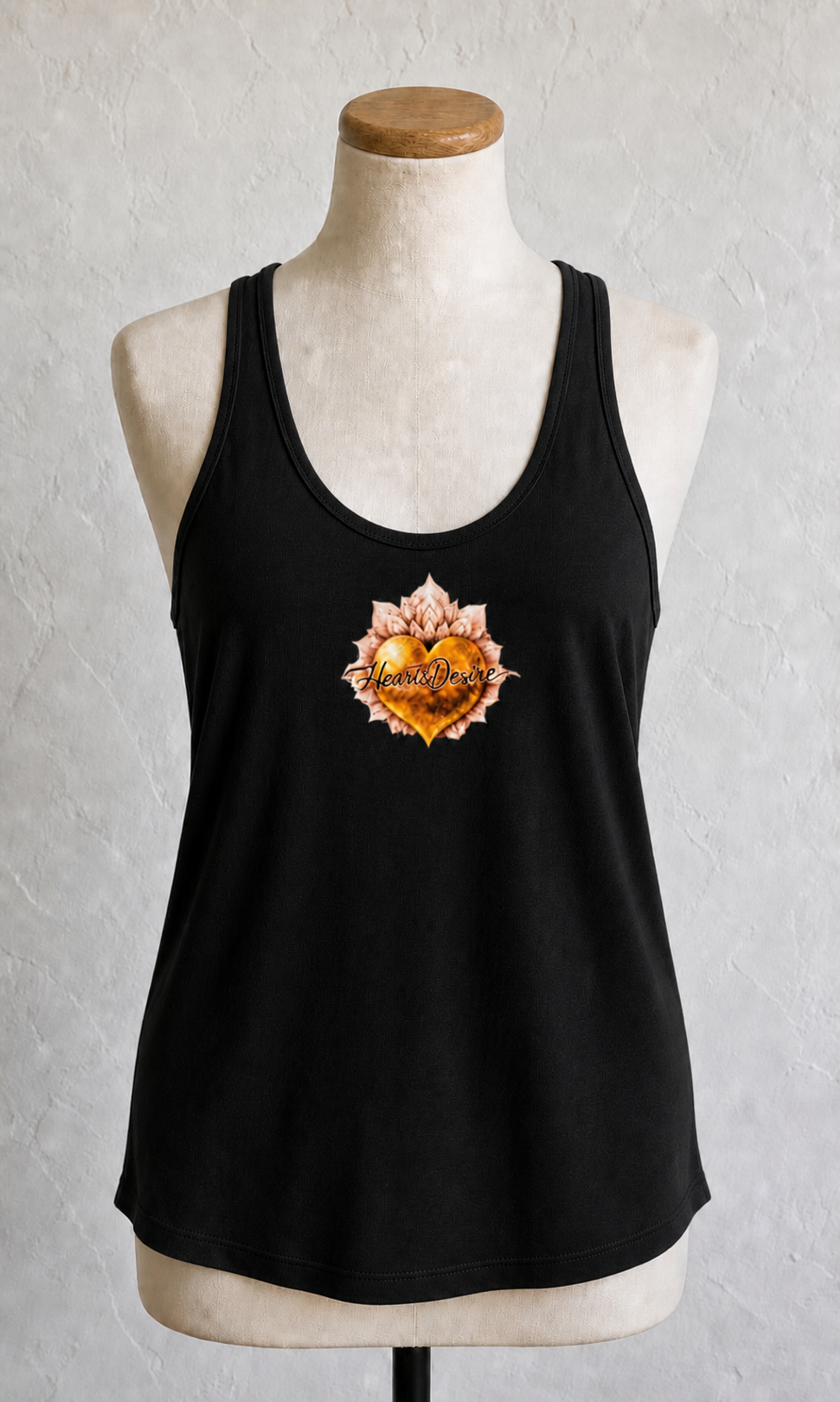 Women’s (xl) loose-fit racerback tank top in black with Heart’s Desire heart logo graphic
