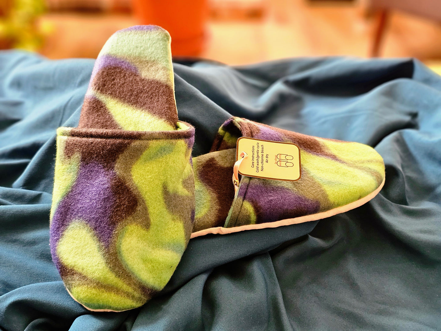 fleece slippers – size 8–9 large– lime green and purple abstract print.”