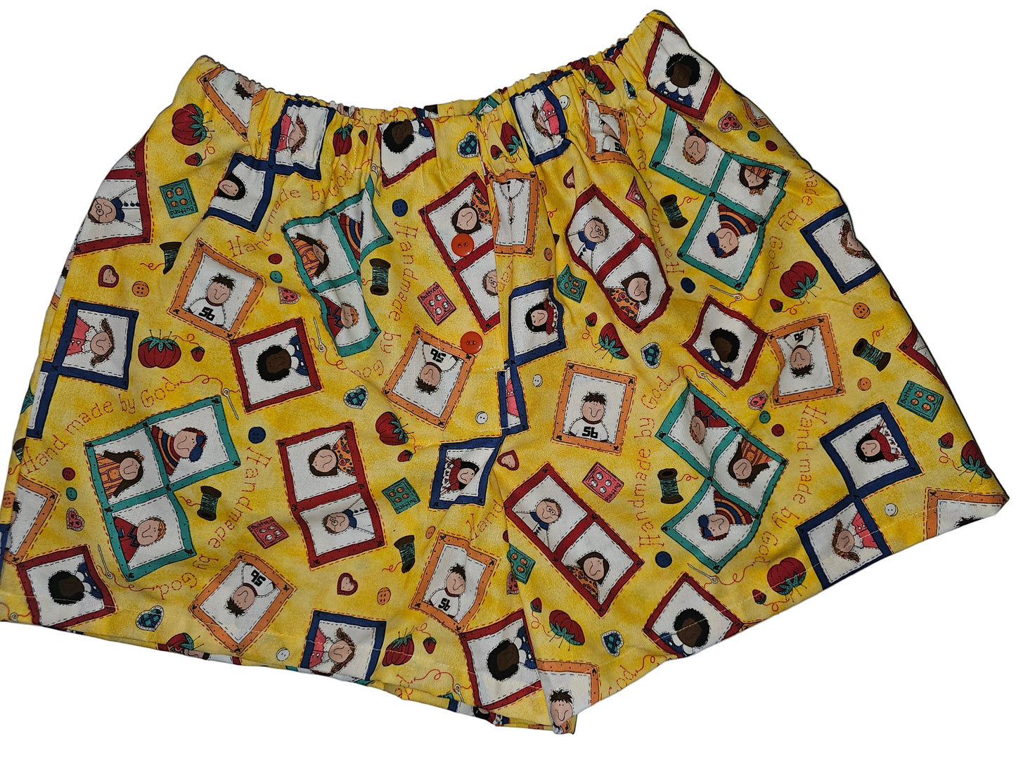 Handmade by God Sunshine Edition medium women’s lounge boxers with deep side pockets, bright yellow base with framed childlike illustrations and sewing-inspired graphics, lightweight and breathable.