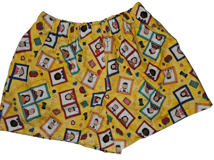 Handmade by God Sunshine Edition medium women’s lounge boxers with deep side pockets, bright yellow base with framed childlike illustrations and sewing-inspired graphics, lightweight and breathable.
