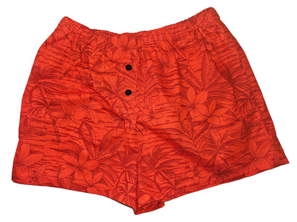 Medium women’s lounge boxers named Hibiscus Afterglow Paradise, featuring a bright coral-orange base with detailed hibiscus floral print and pockets — tropical loungewear perfect for summer relaxation and island-inspired comfort.