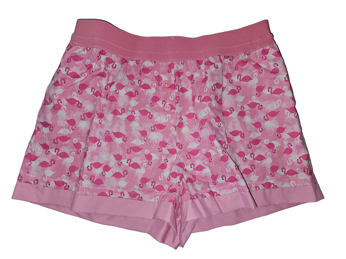 Medium women’s loungewear boxer shorts with a playful pink flamingo print, featuring a soft 2-inch elastic waistband in solid pink and matching light-pink trim at the leg openings. Handmade cotton design with deep side pockets for breathable, all-day comfort.