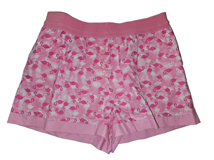 Medium women’s loungewear boxer shorts with a playful pink flamingo print, featuring a soft 2-inch elastic waistband in solid pink and matching light-pink trim at the leg openings. Handmade cotton design with deep side pockets for breathable, all-day comfort.