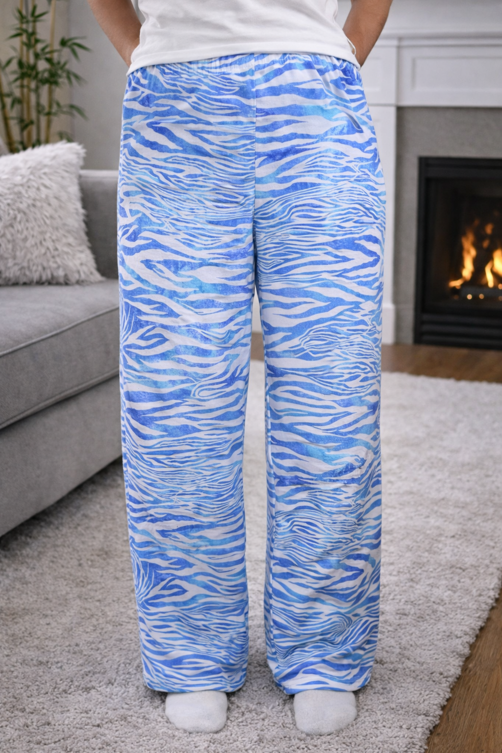 Women’s medium size blue zebra print pajama pants with relaxed fit, soft fabric,  full-length draped legs for comfortable loungewear