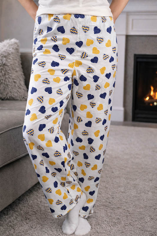 Women’s medium heart-print pajama pants with relaxed fit, soft cotton fabric, and long draped legs for comfortable home wear