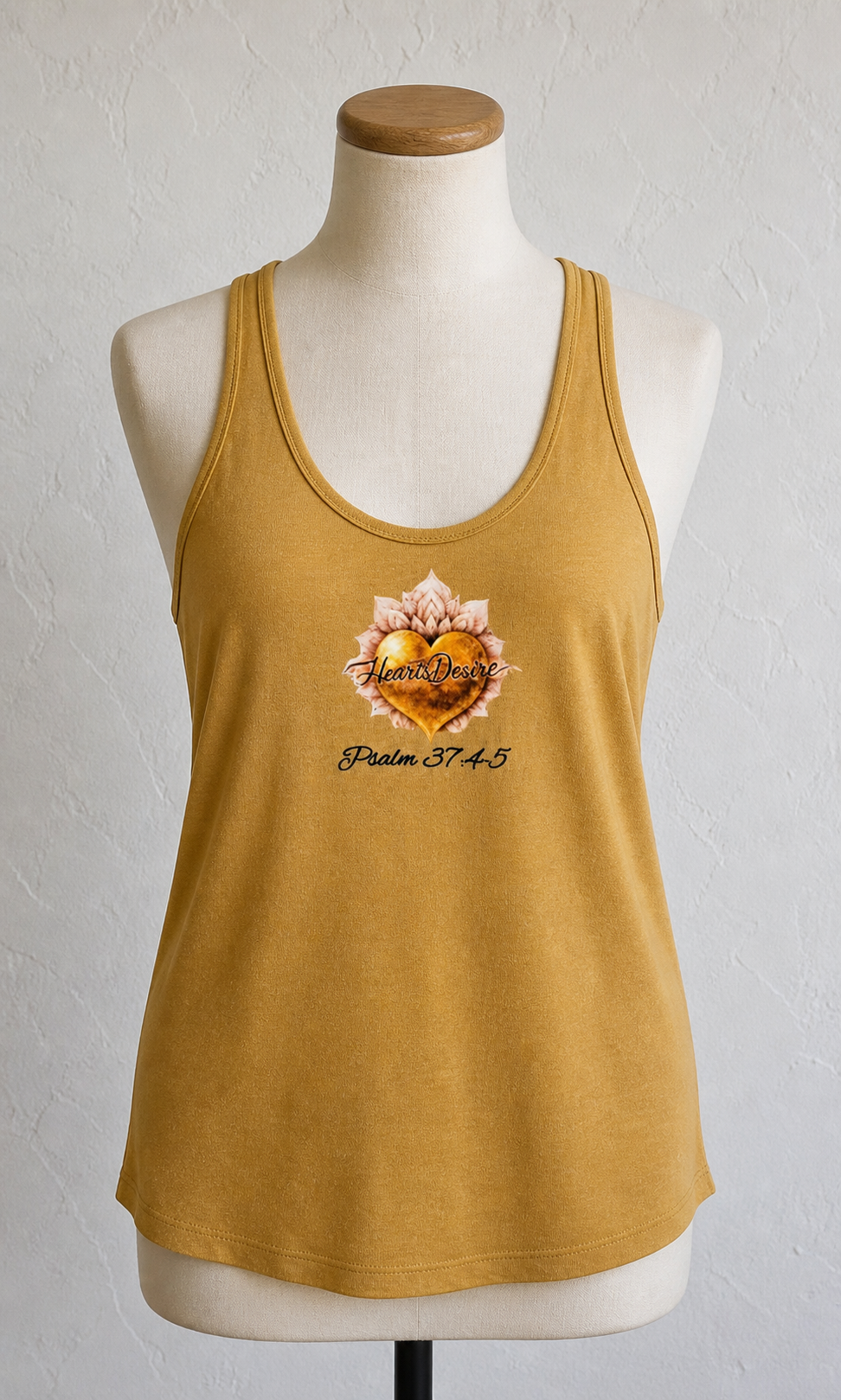 Women’s (XXL) loose-fit racerback tank top in mustard gold with Heart’s Desire heart logo and Psalm 37:4-5 graphic